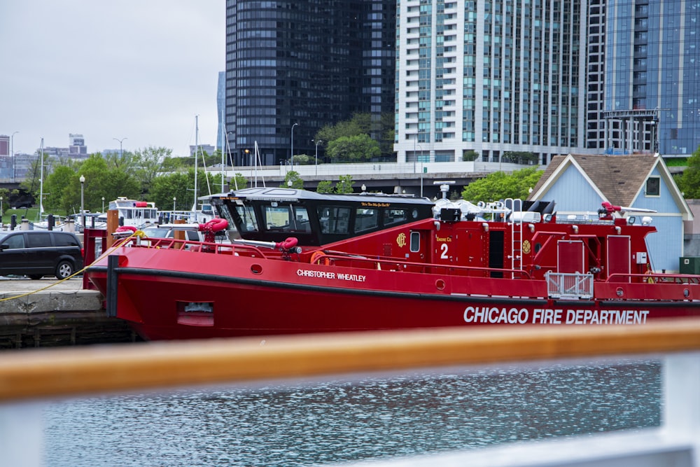 a chicago fire department boat docked in a harbor