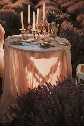 A beautifully arranged table with lavender-inspired decor.