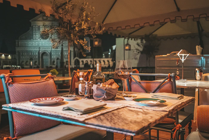 A table set for two at Sizzlers with formal place settings