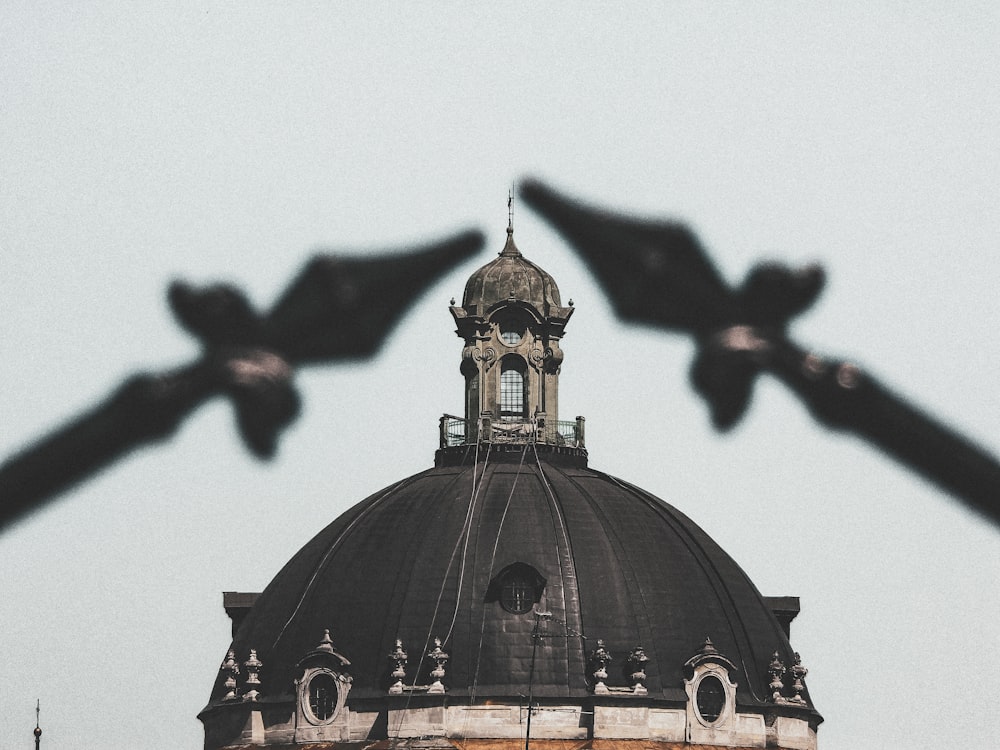 a large dome with a clock on top of it