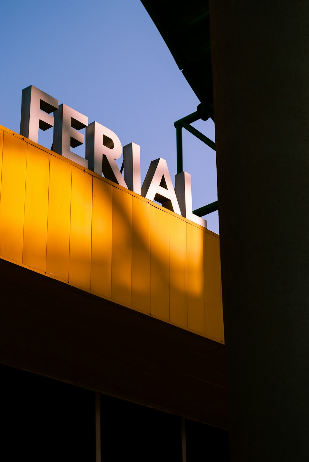a yellow building with a sign that says federal