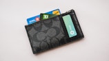 a wallet with credit cards sticking out of it