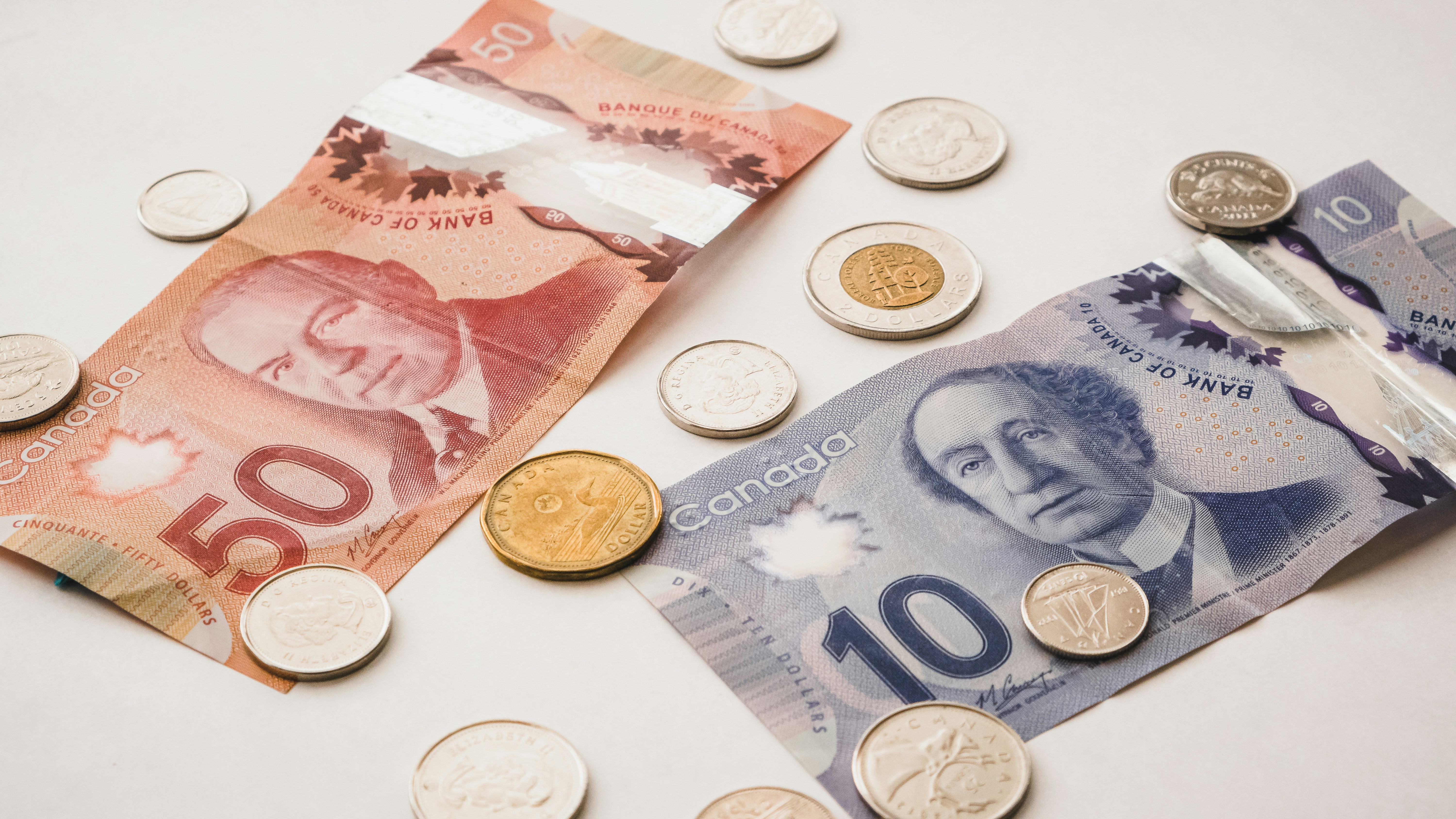 Canadian Bills & Coins ($50, $10, loonie, quarter, toonie, dime)