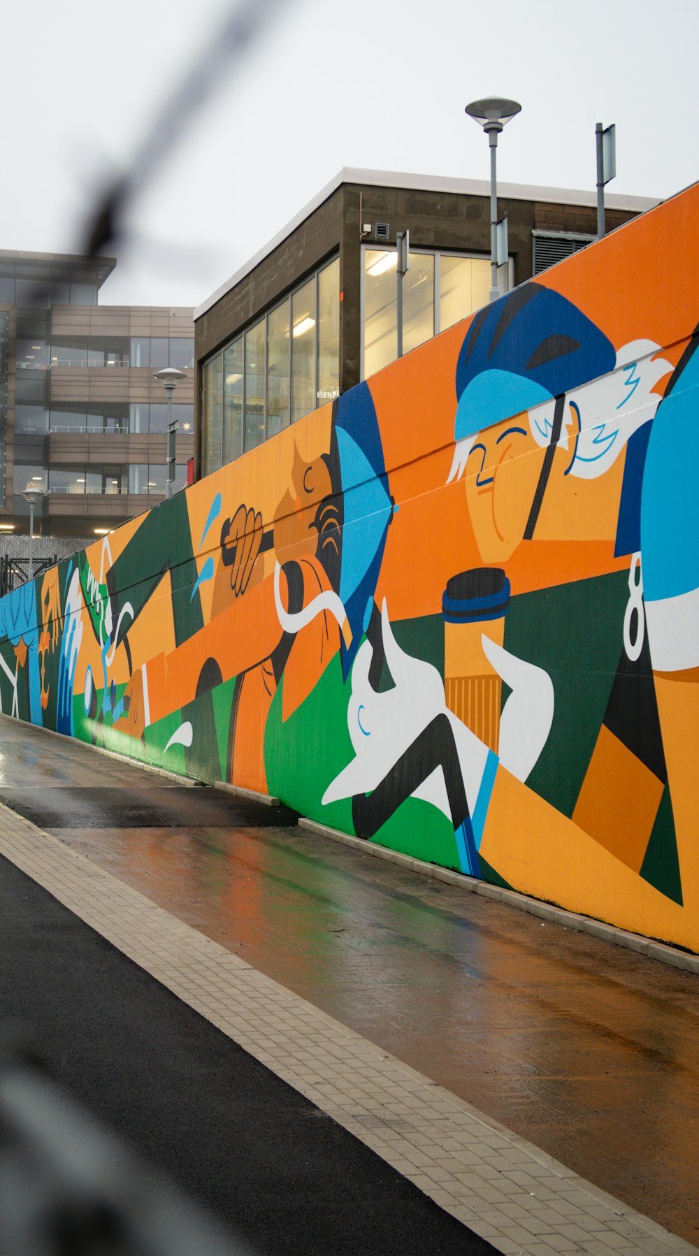 a large mural of people on the side of a building