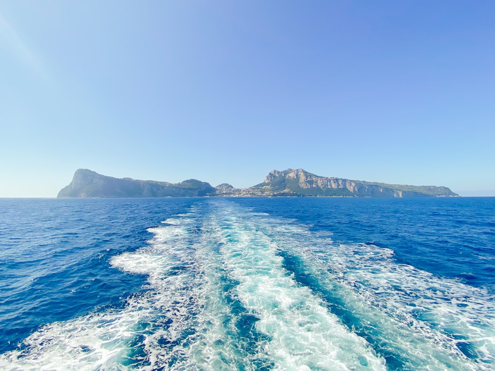 the wake of a boat in the open ocean