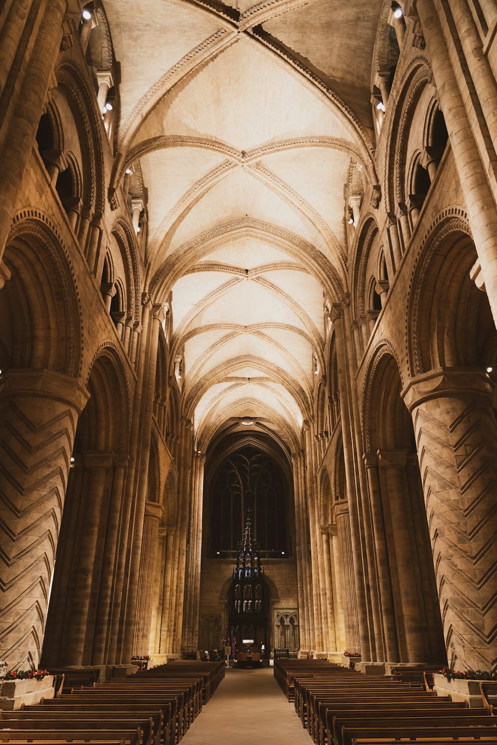 a large cathedral with vaulted ceilings and wooden pews