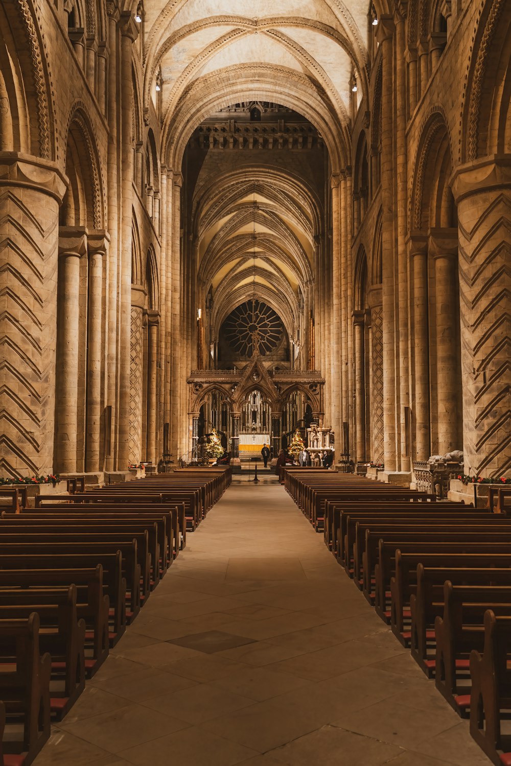 a large cathedral with rows of pews
