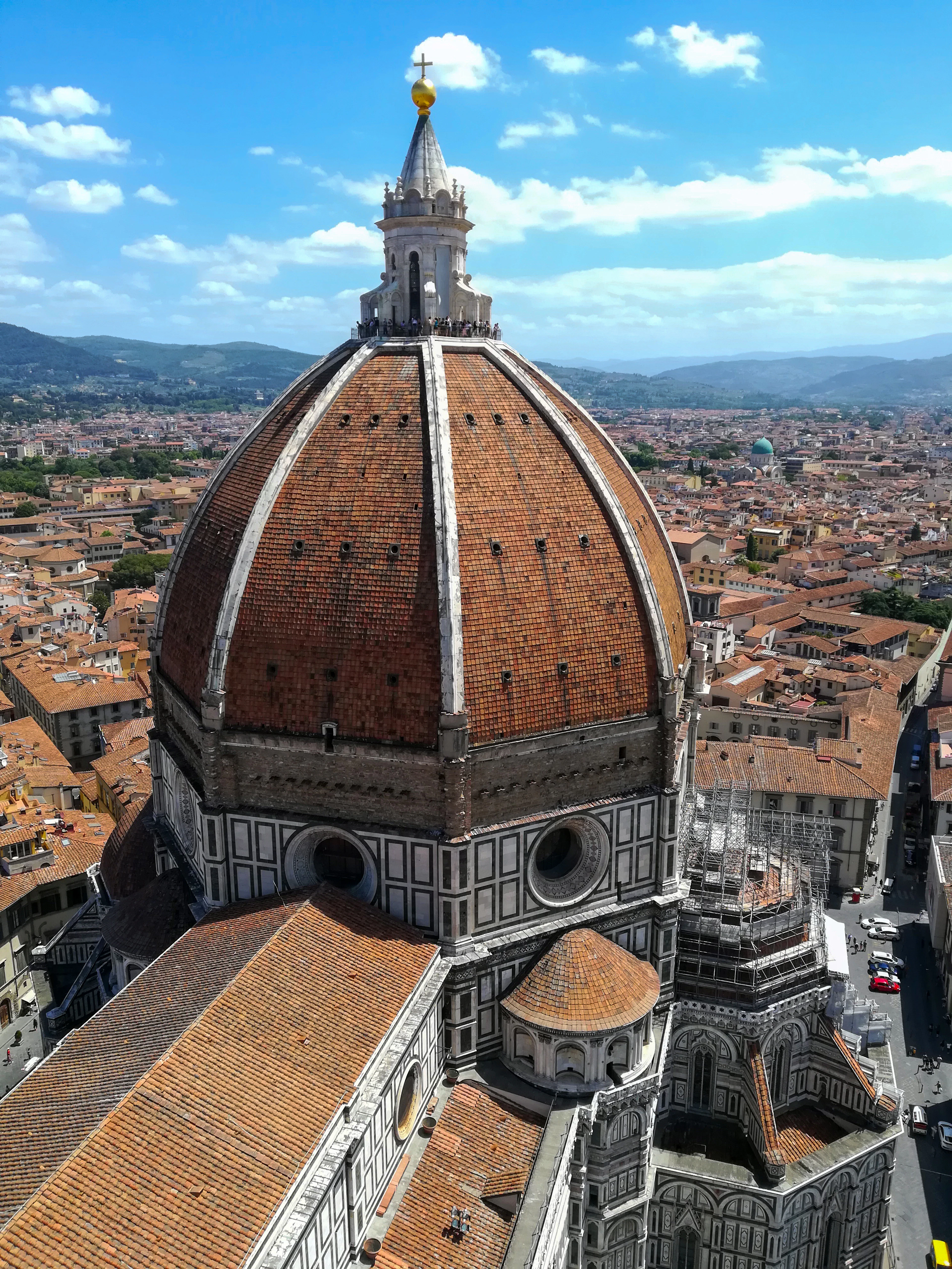 Brunelleschi's dome from the campanile, its terracotta tiles and white ribs above the rooftops of Florence