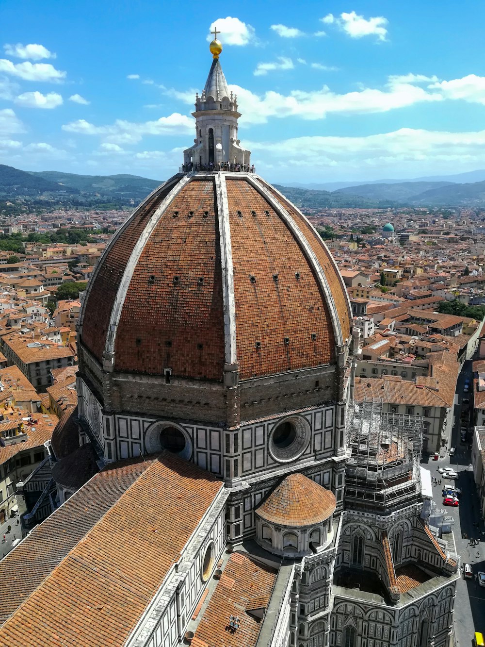 an aerial view of a large building with a dome