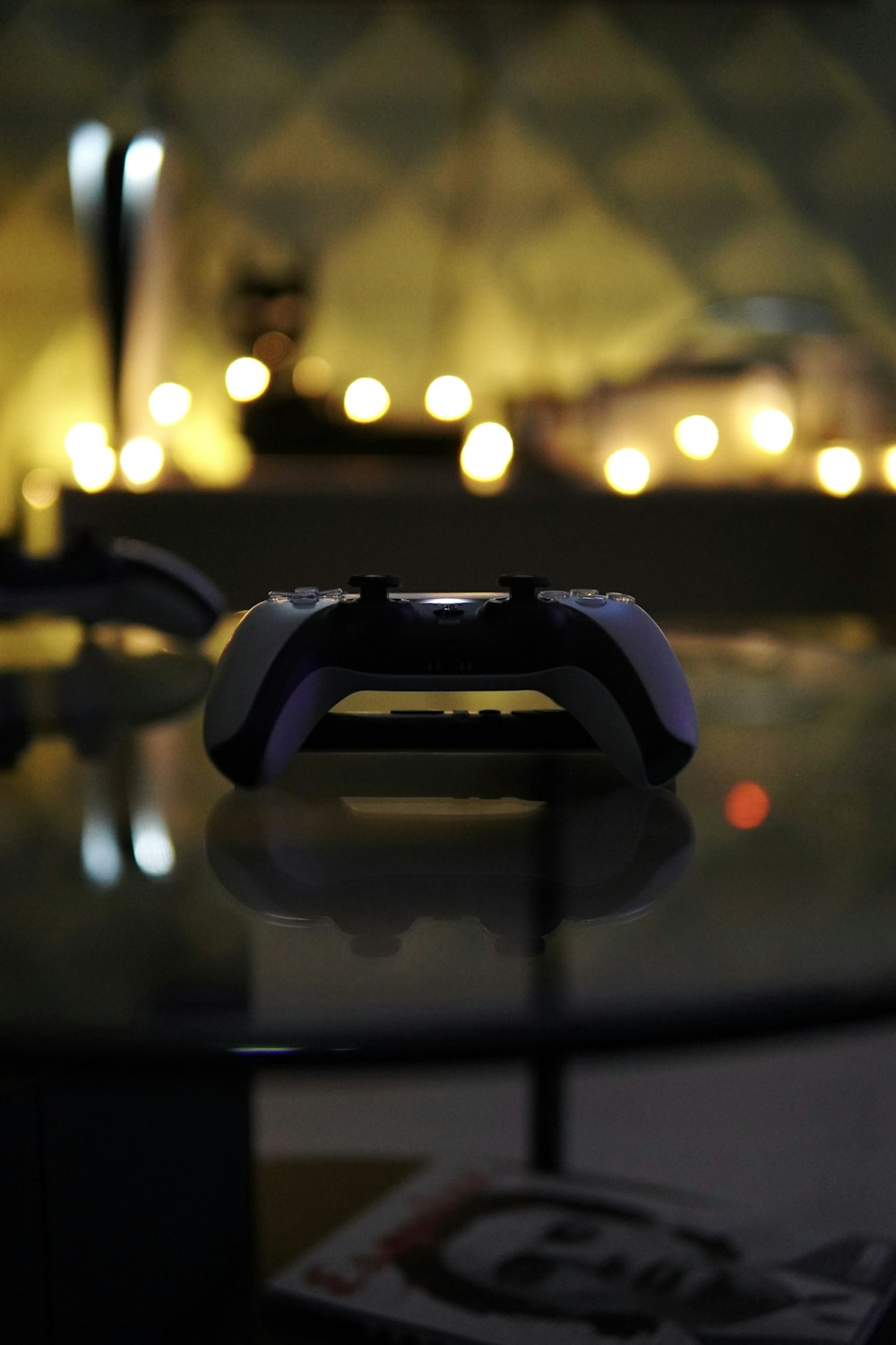 a video game controller sitting on top of a table