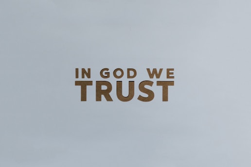 the words in god we trust are cut out of wood