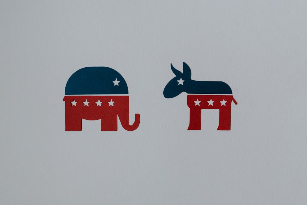 an elephant and a donkey with stars on them