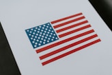 a piece of paper with an american flag on it
