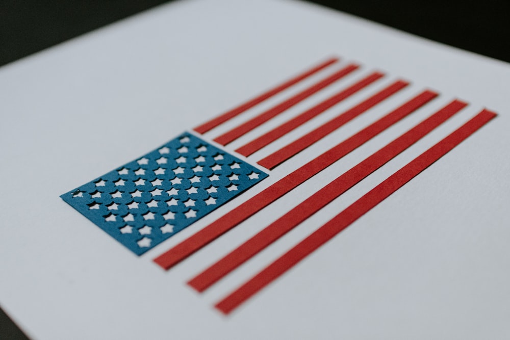 a close up of an american flag on a piece of paper