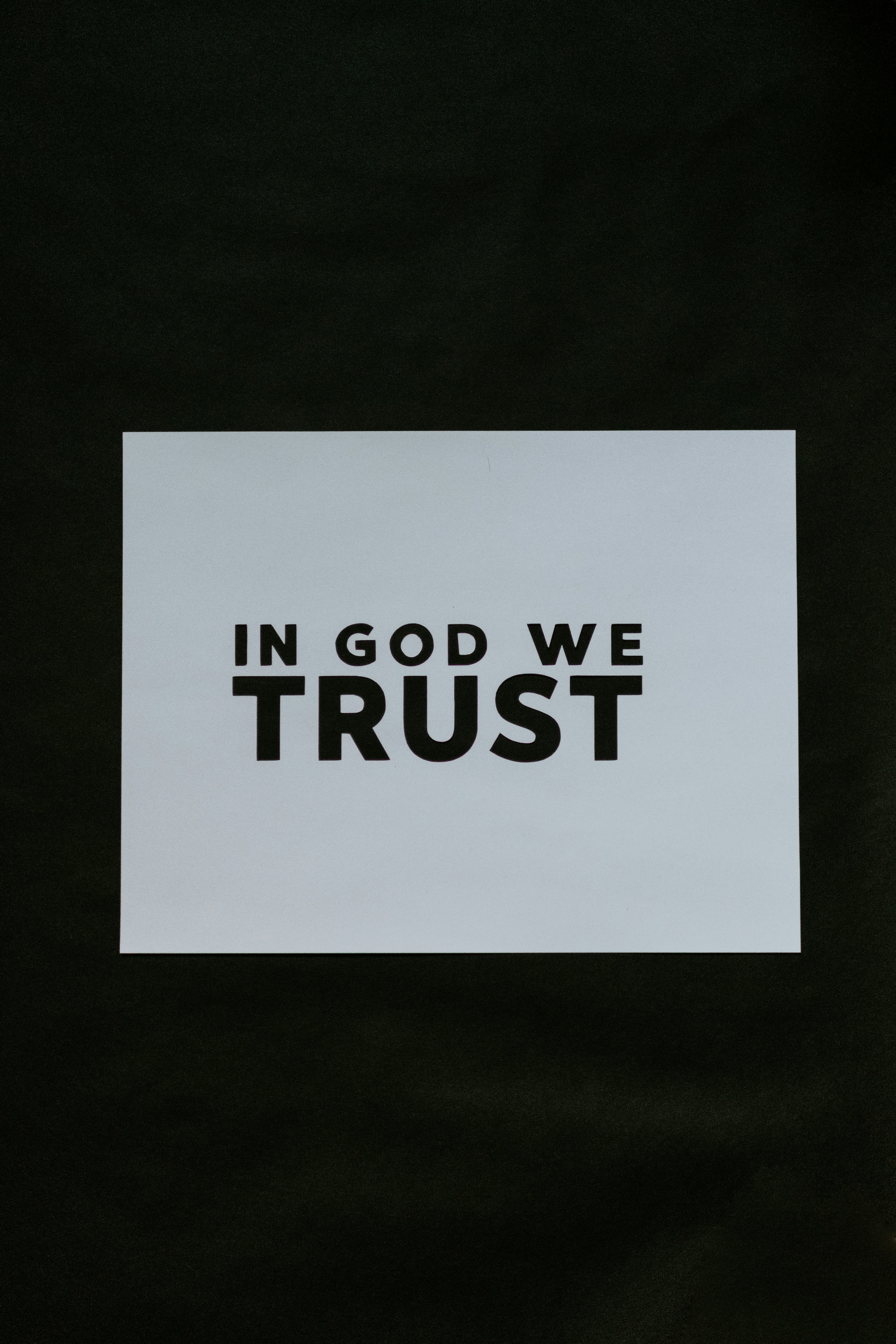 In God We Trust cut out of paper