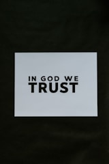 a sticker that says in god we trust