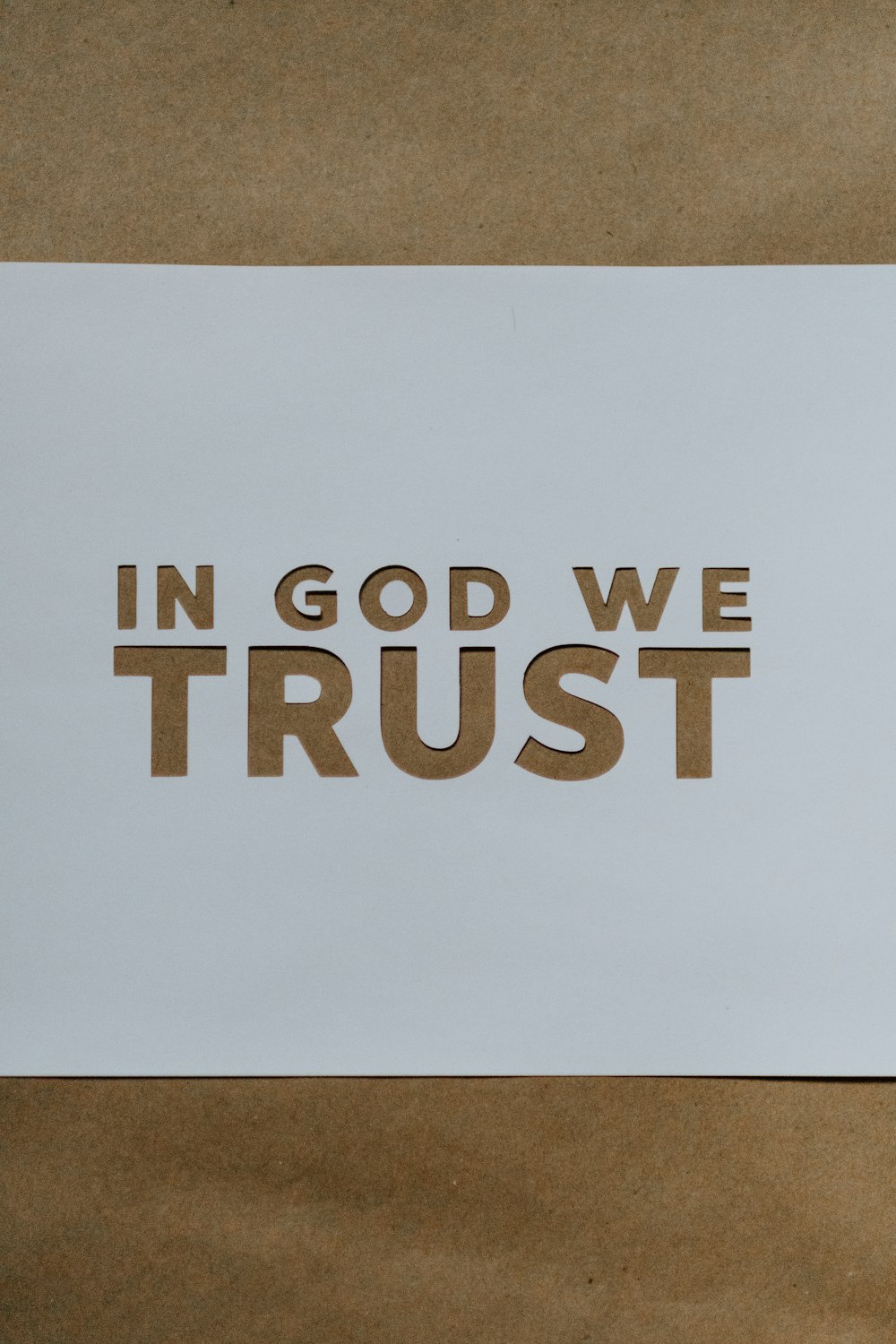 a piece of paper that says in god we trust