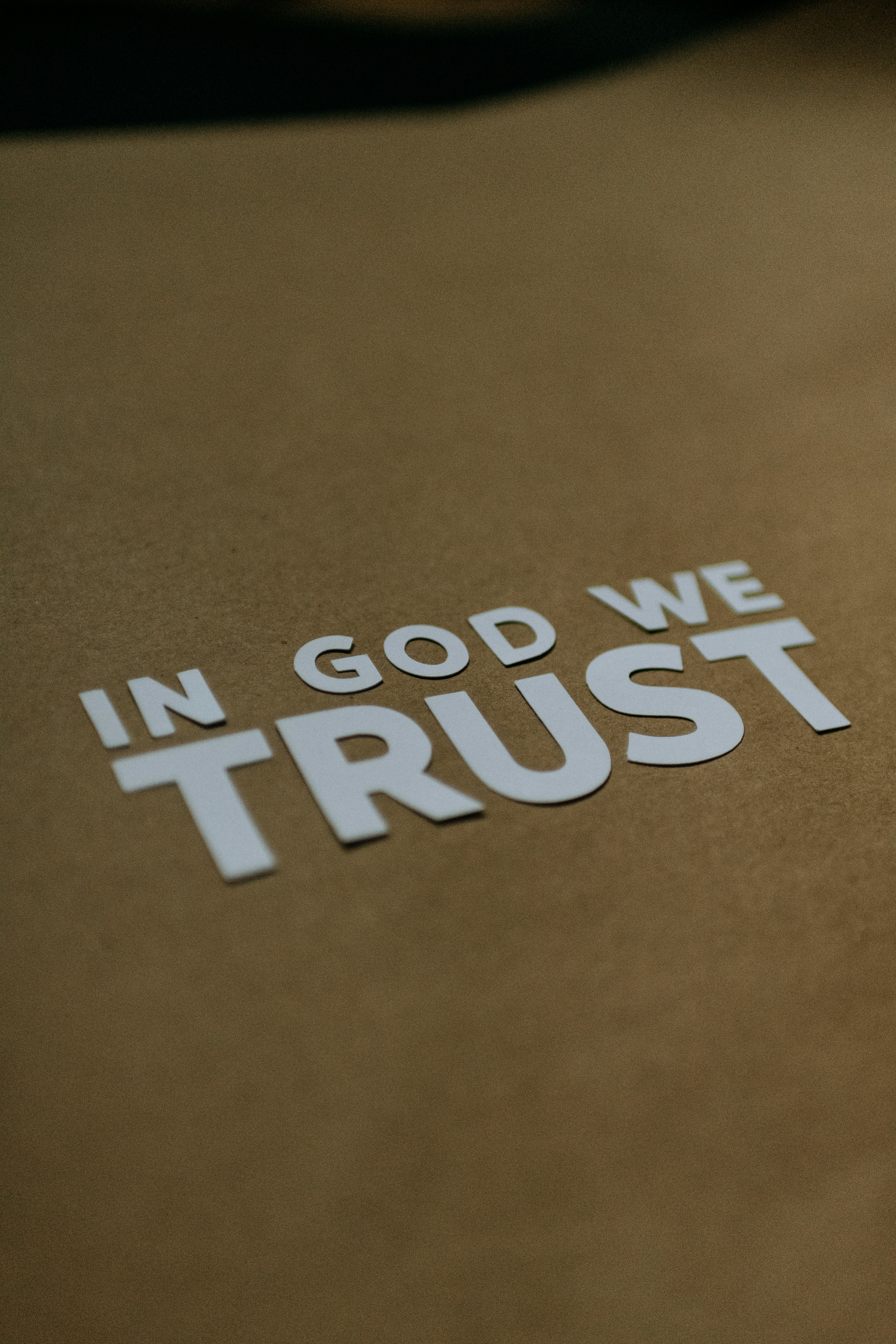 In God We Trust cut out of paper