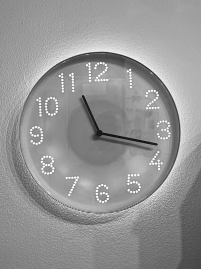 a clock that is on the wall in a room