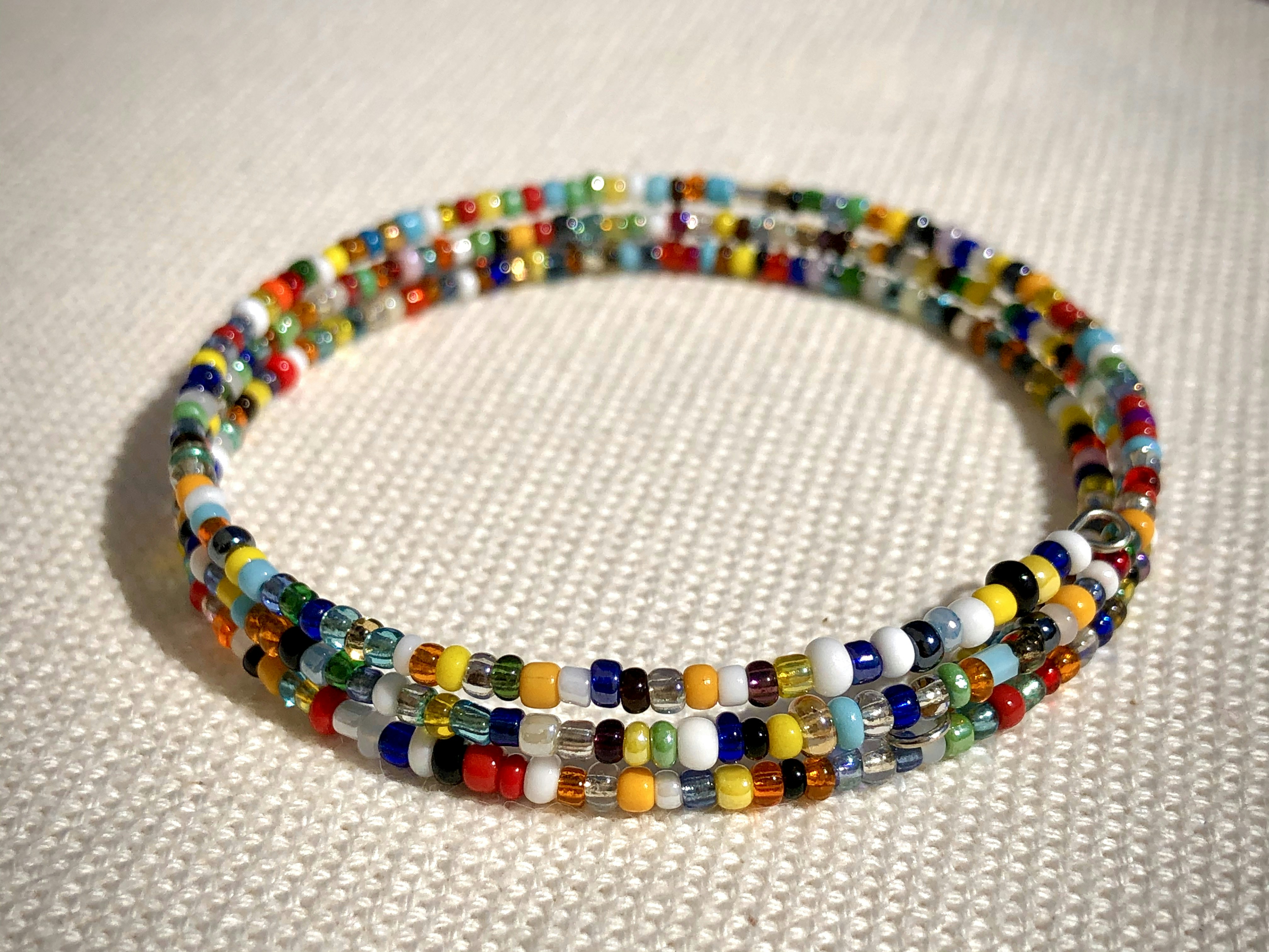 a close up of a bracelet on a table
