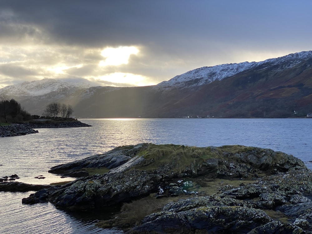 a large body of water surrounded by mountains