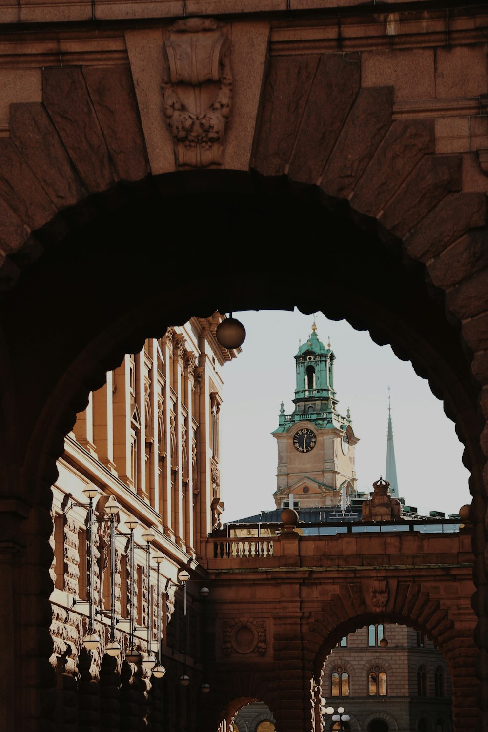 a large clock tower towering over a city