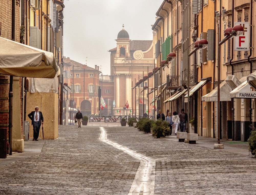 a cobblestone street in a european city