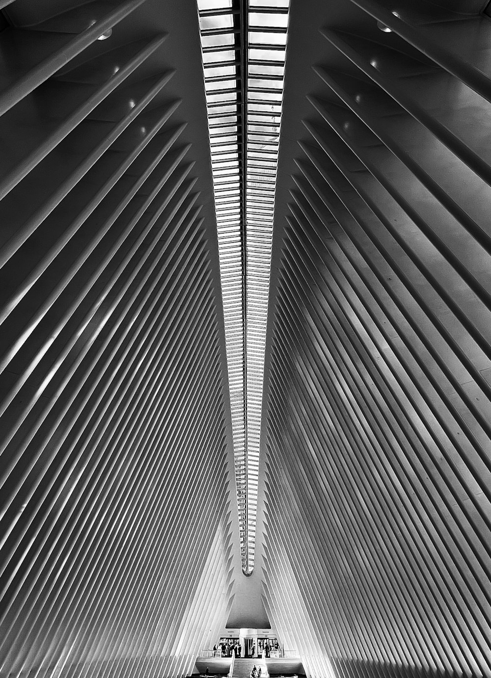 a black and white photo of a train station