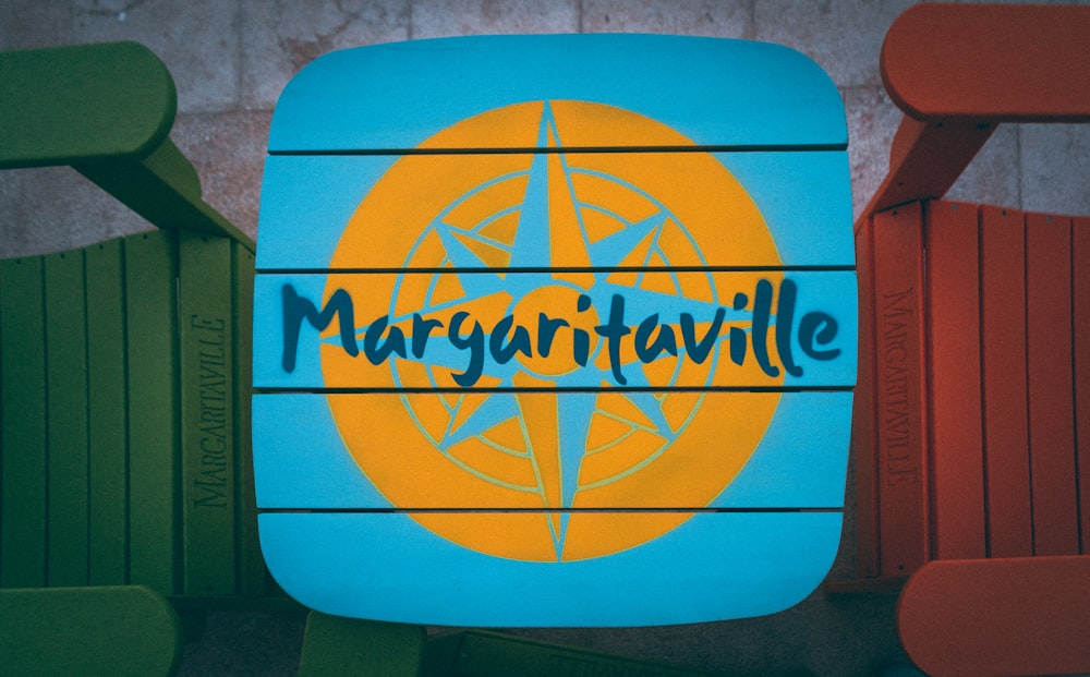 a blue and yellow sign that reads margaritaville