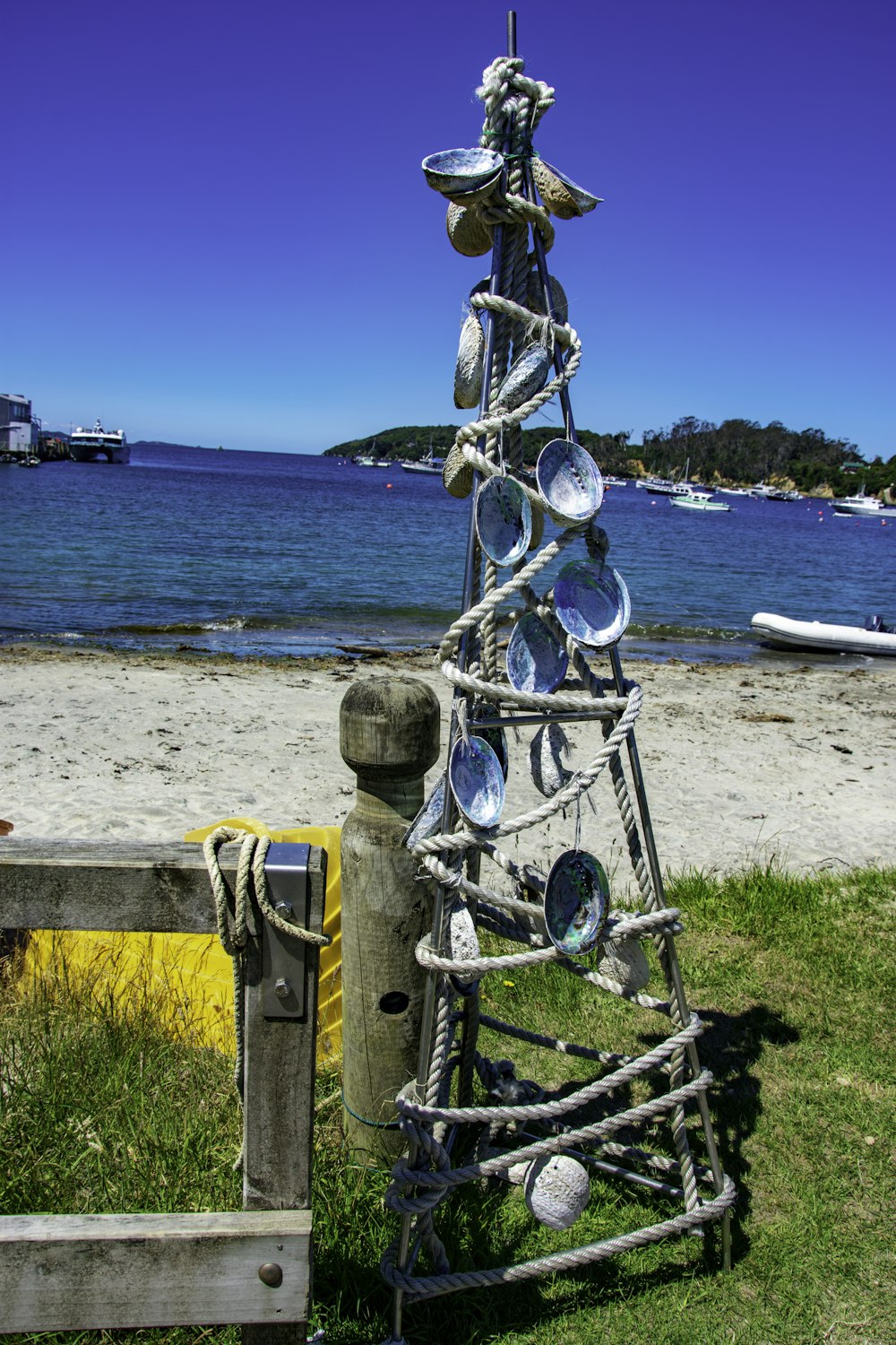 a tree made out of metal pots and pans