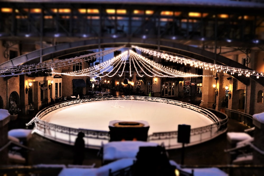 an overhead view of a skating rink at night