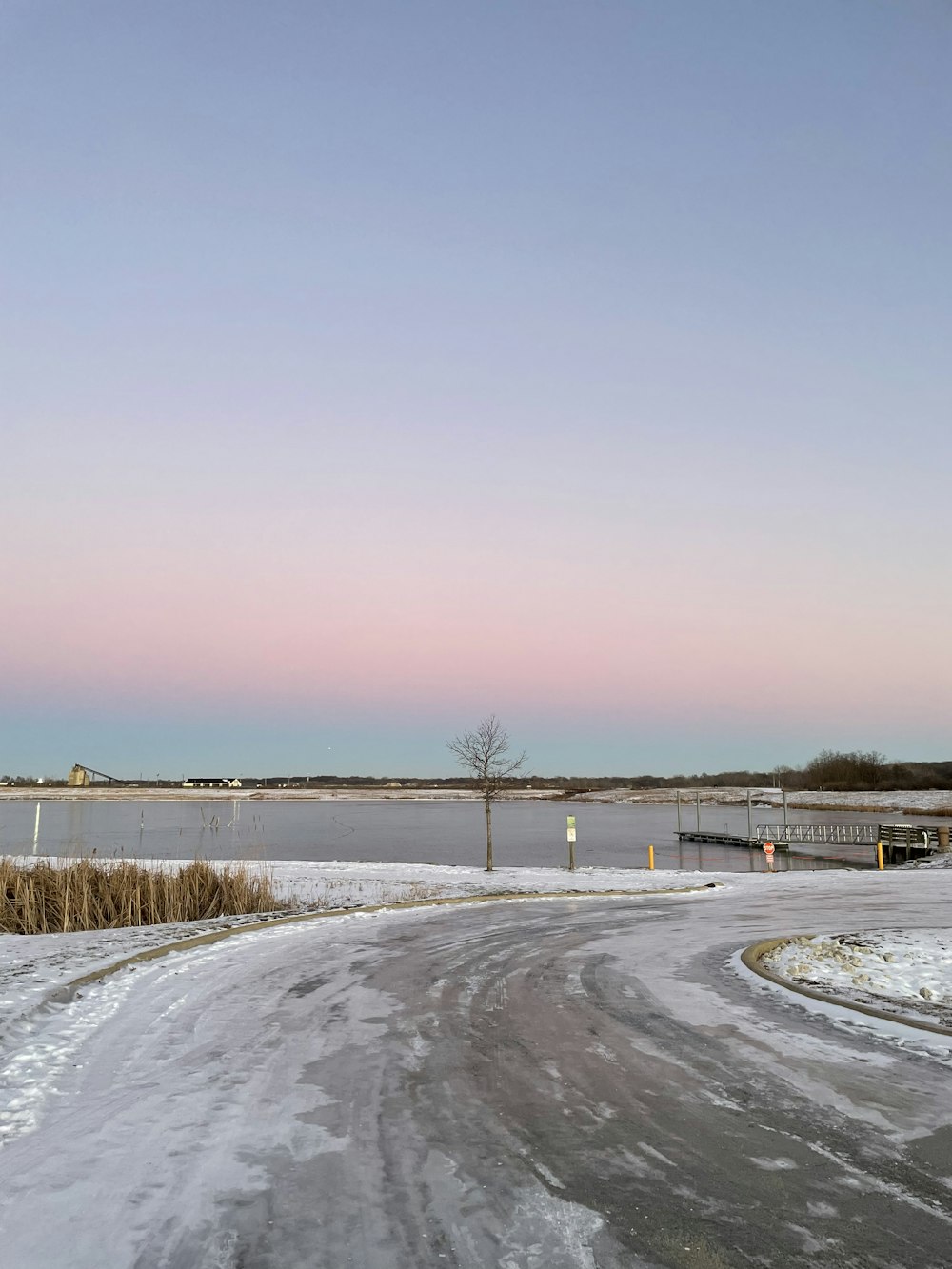 a road that has some snow on it