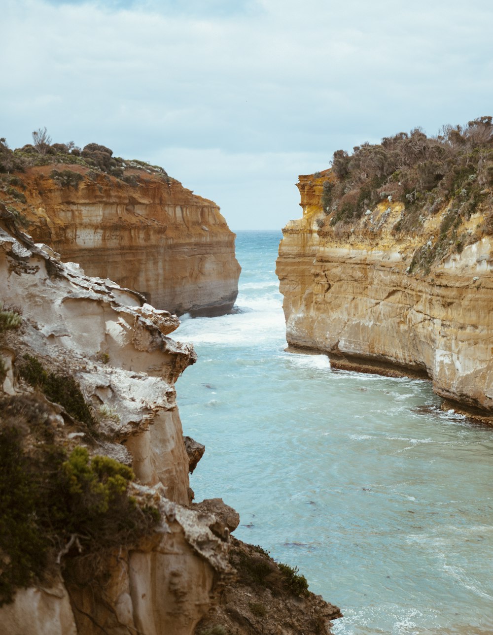 a view of the ocean from a cliff