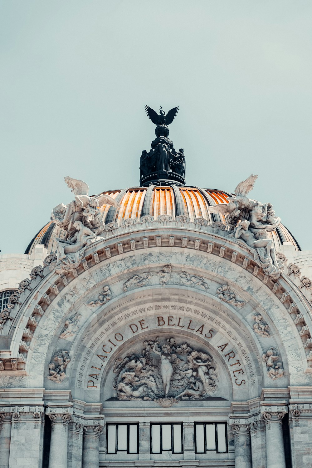 a building with a statue on top of it