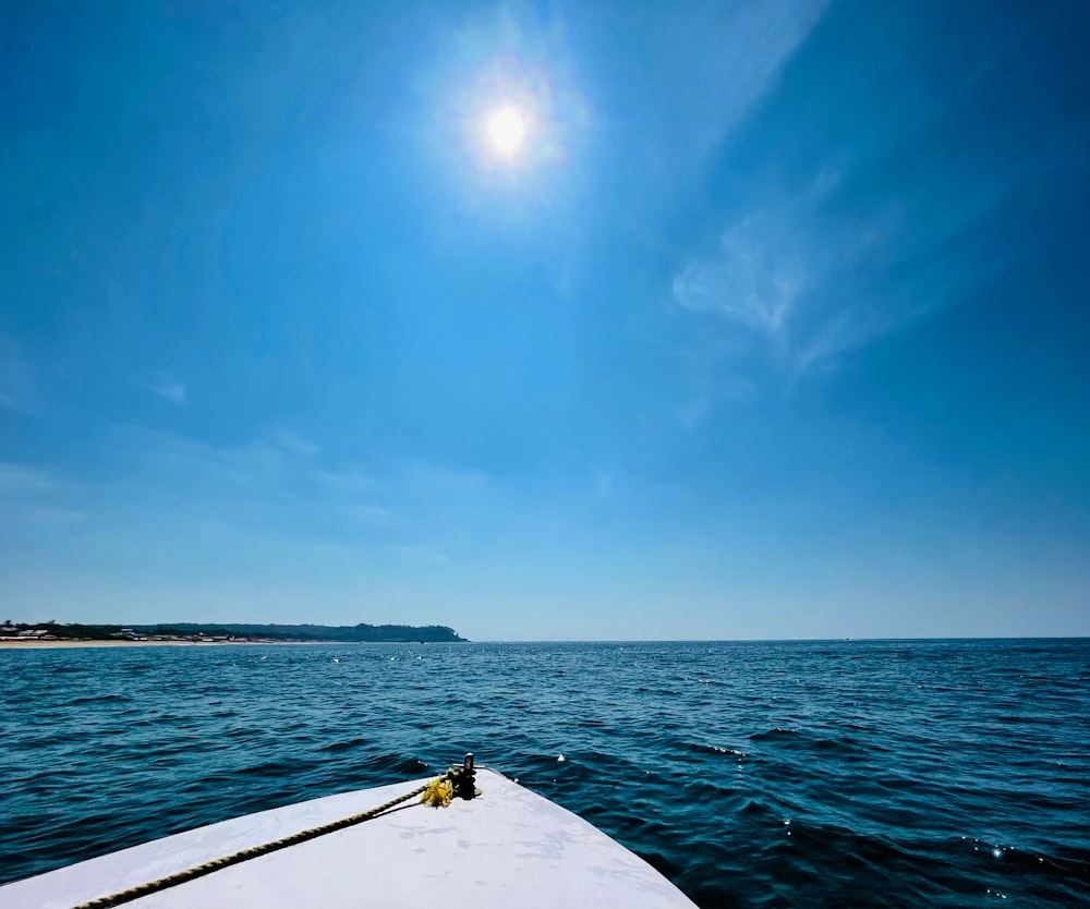 a view of the ocean from the front of a boat