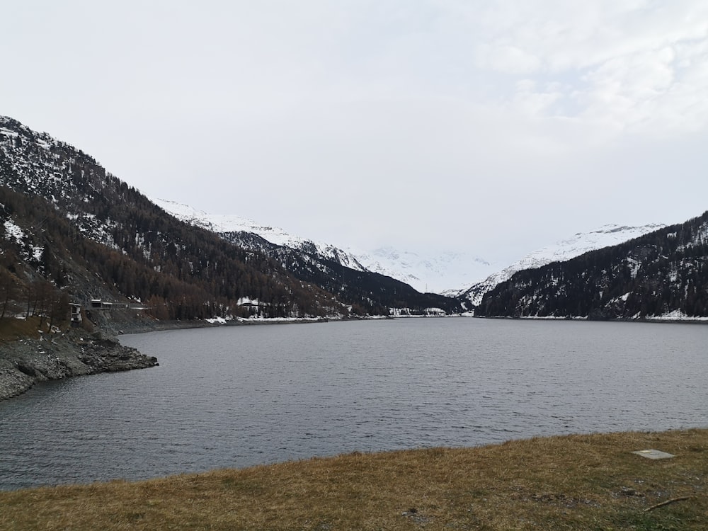 a large body of water surrounded by mountains