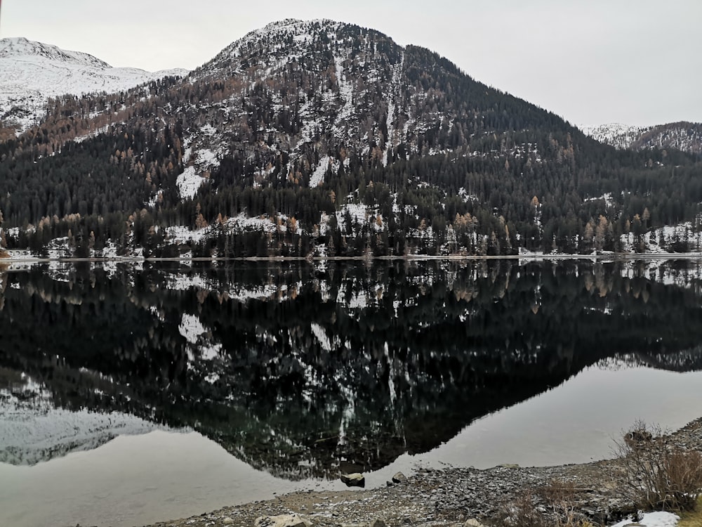 a mountain with a lake in front of it