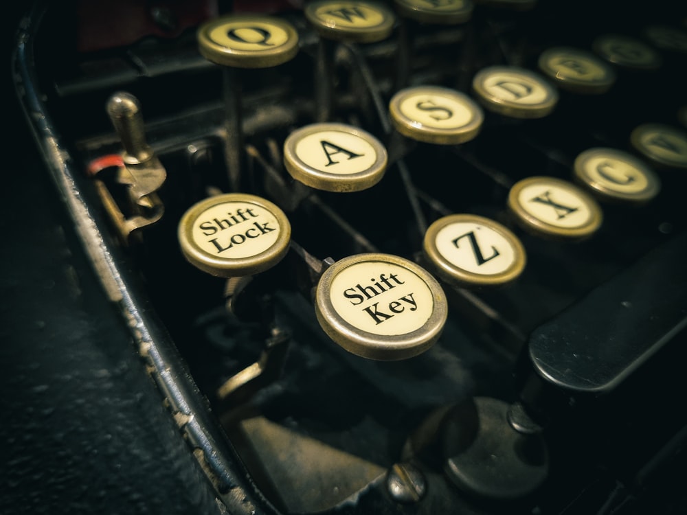 a close up of an old fashioned typewriter