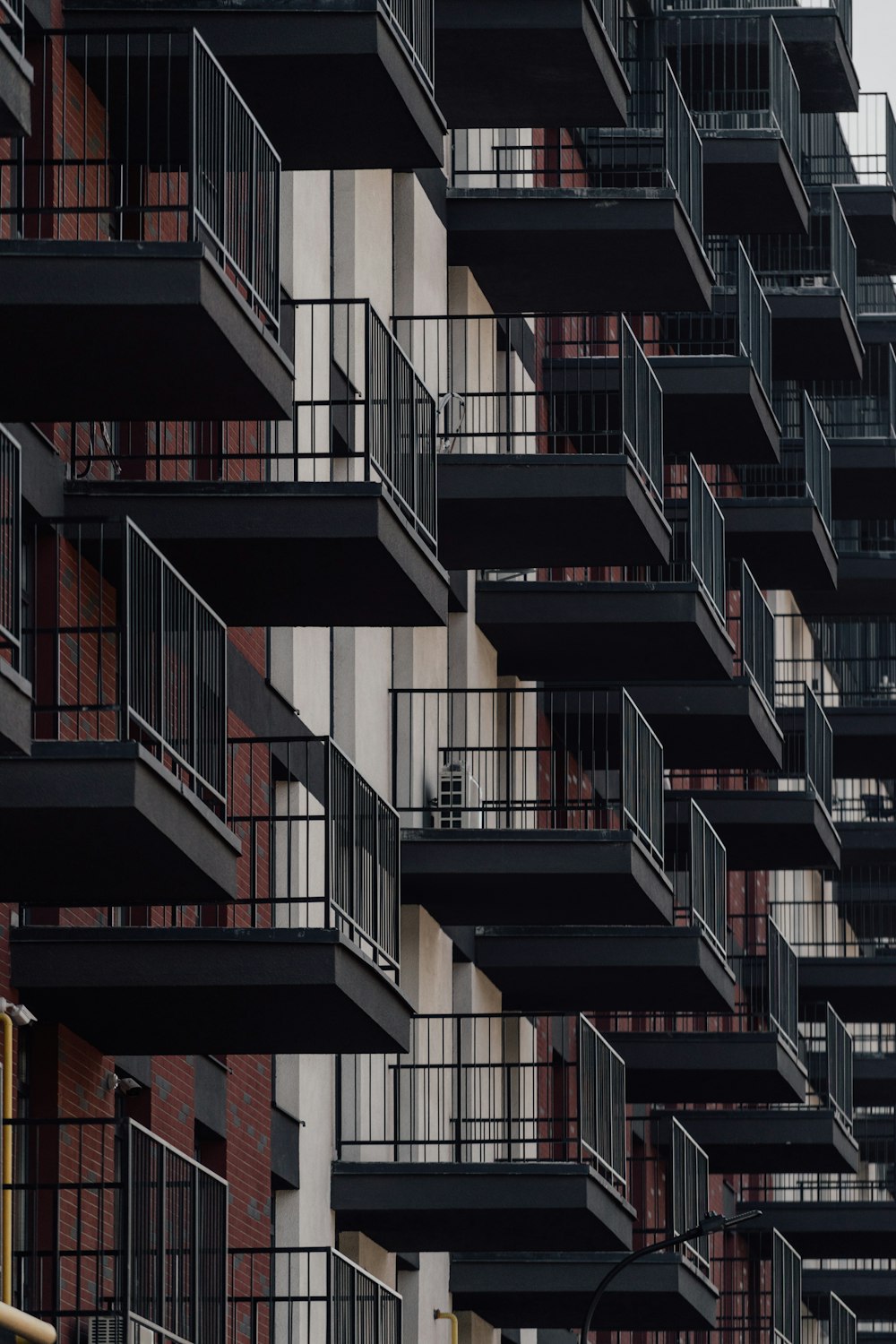 a tall building with balconies and balconies on it