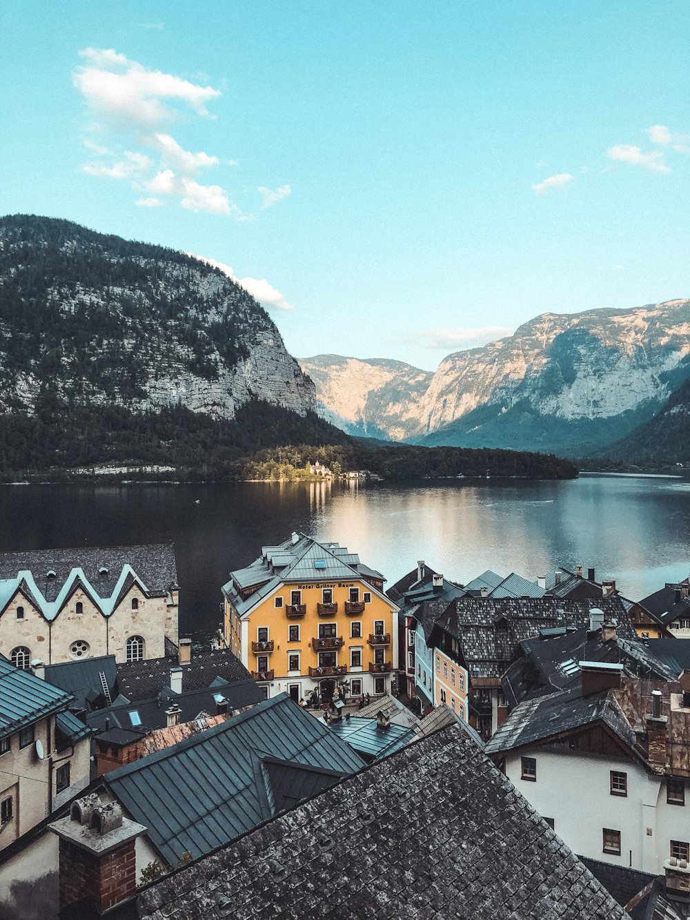 a view of a city with mountains in the background