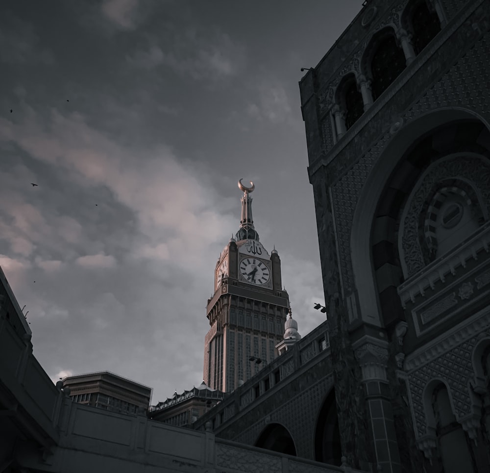 a large clock tower towering over a city