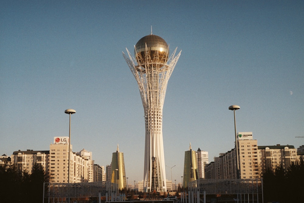 a very tall building with a very tall tower in the background