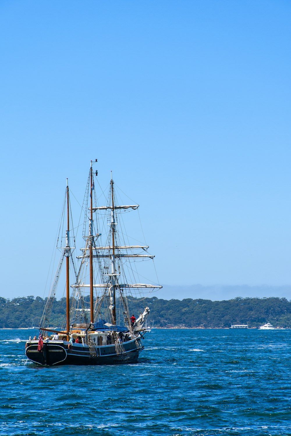 a large boat floating on top of a large body of water