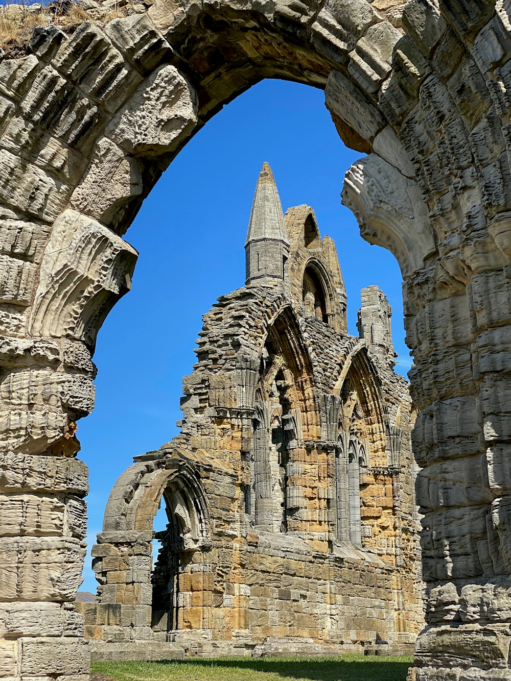 a large stone building with an arched doorway