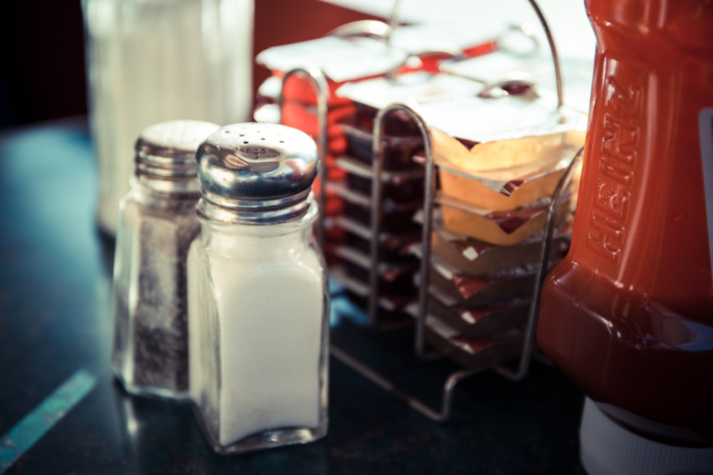 two salt and pepper shakers on a table