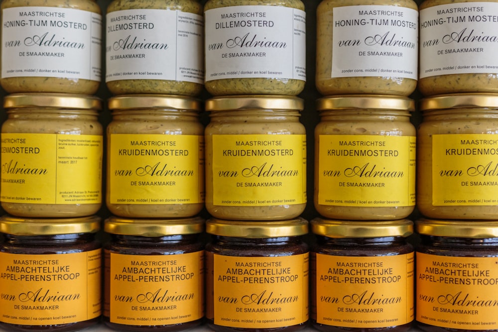 many jars of different types of food on a shelf