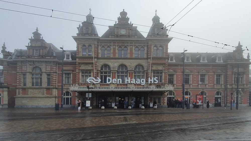 a train station with a train on the tracks