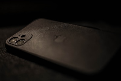 a close up of a cell phone on a table