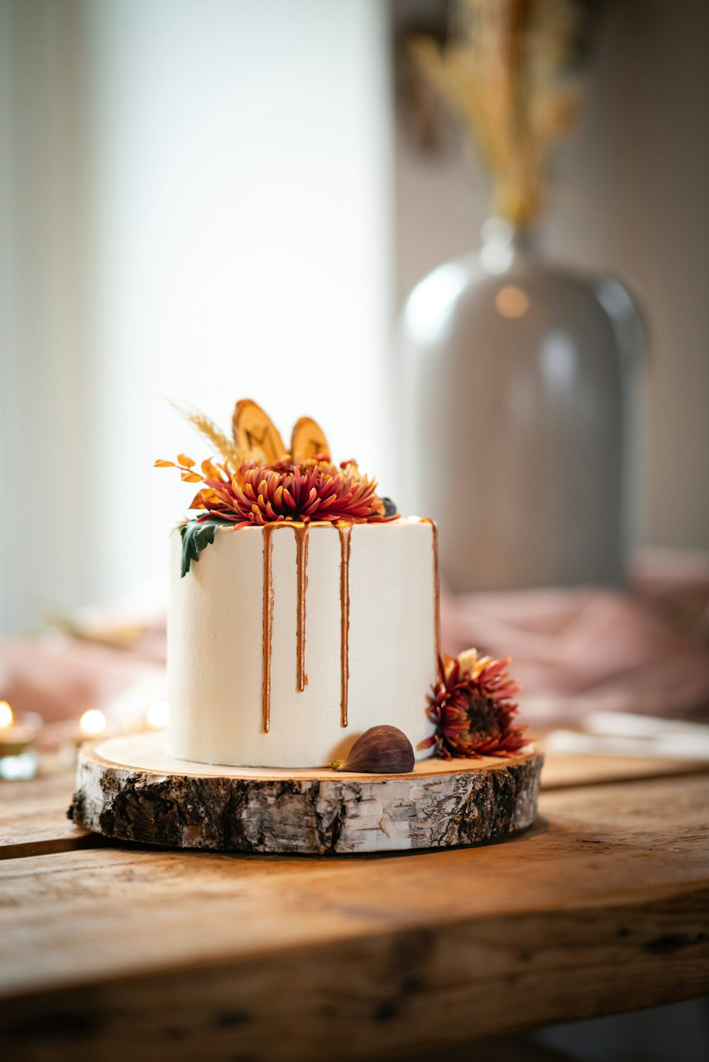 a white cake sitting on top of a wooden table