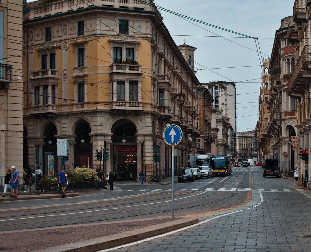 a street scene with a bus on the road